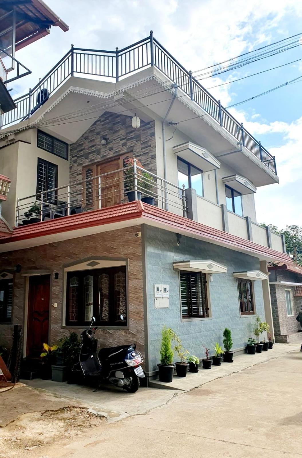 Varam Homestay Madikeri Esterno foto